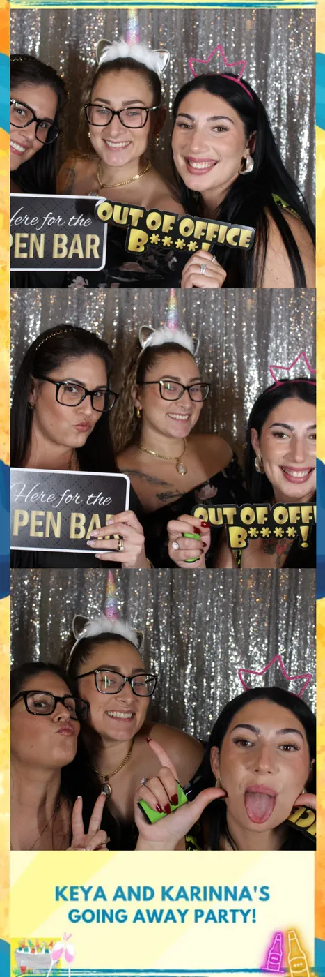 Friends posing together at a photo booth