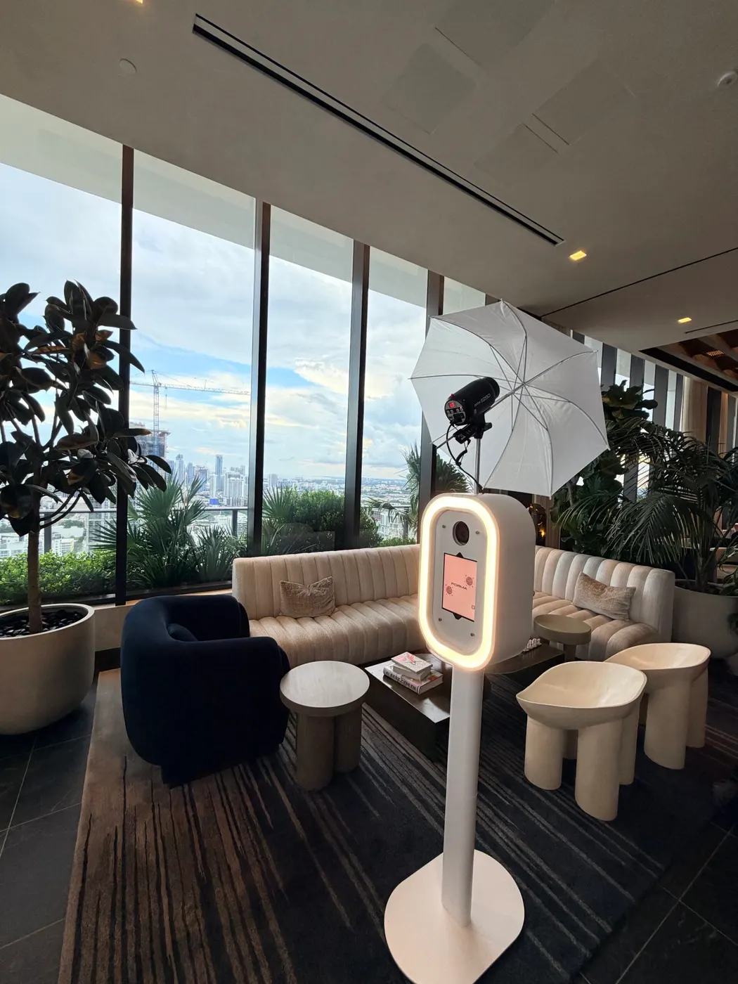 Photo booth set up in a modern waterfront event lounge