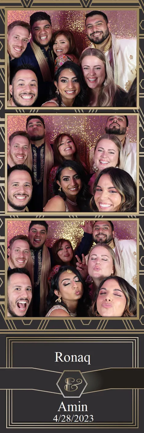 Friends in gold-framed photo booth prints